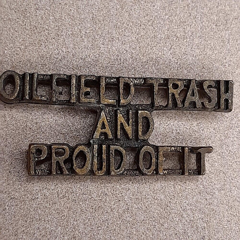 Vintage OILFIELD TRASH & PROUD OF IT metal lapel pin Gold/Brass-Tone Western